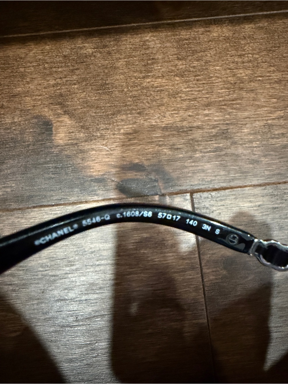 CHANEL Black Glossy Cat-Eye Sunglasses with Logo Accent - Picture 11 of 12